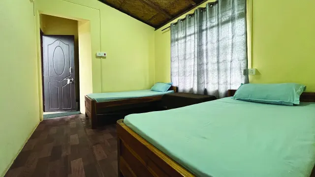 Room 3 seen from the window side, with the door to the bathroom